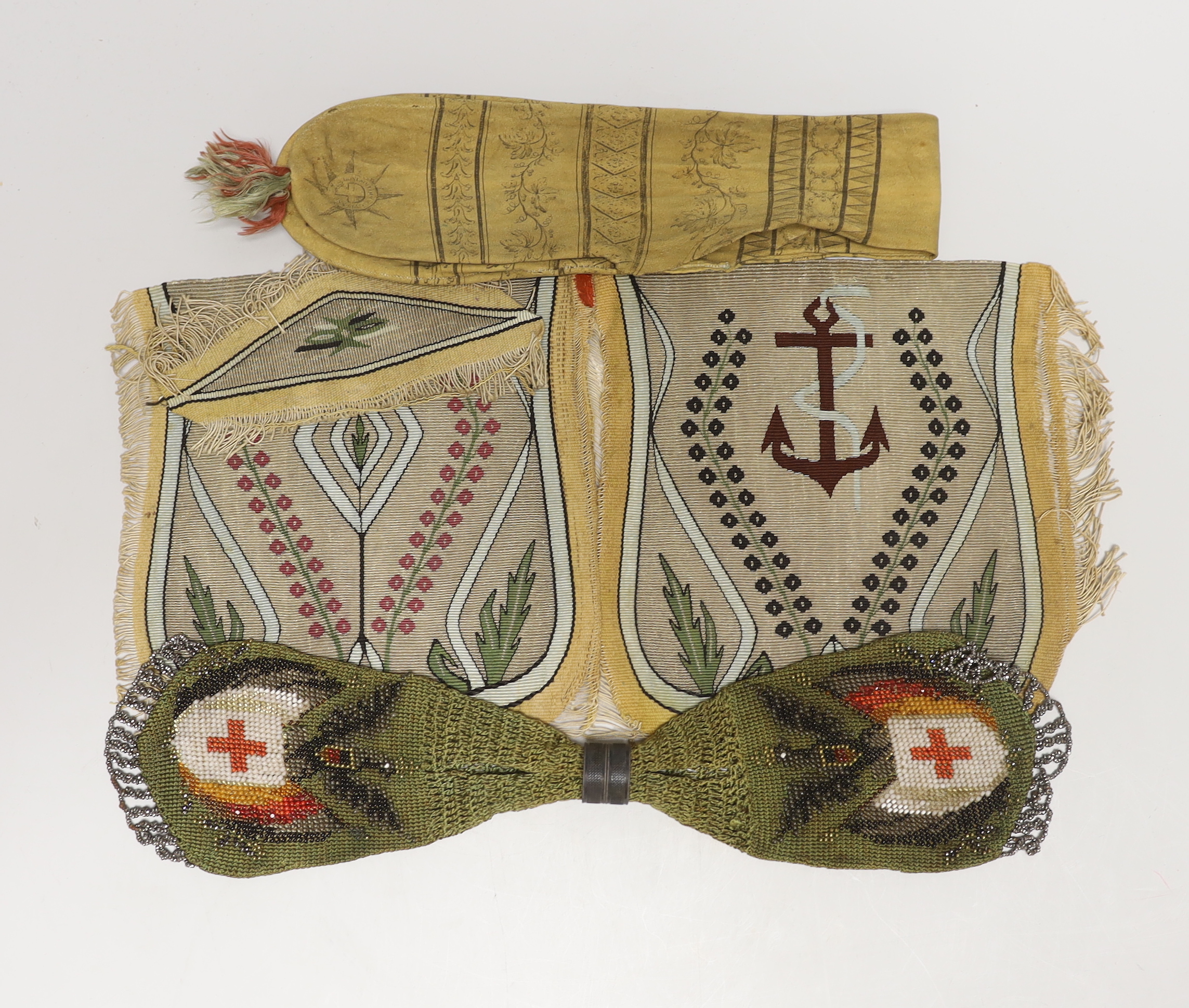 An 18th century American leather misers purse dated 1793, an unused finely woven tapestry, an early 19th century bead worked misers purse, longest misers purse 48cm